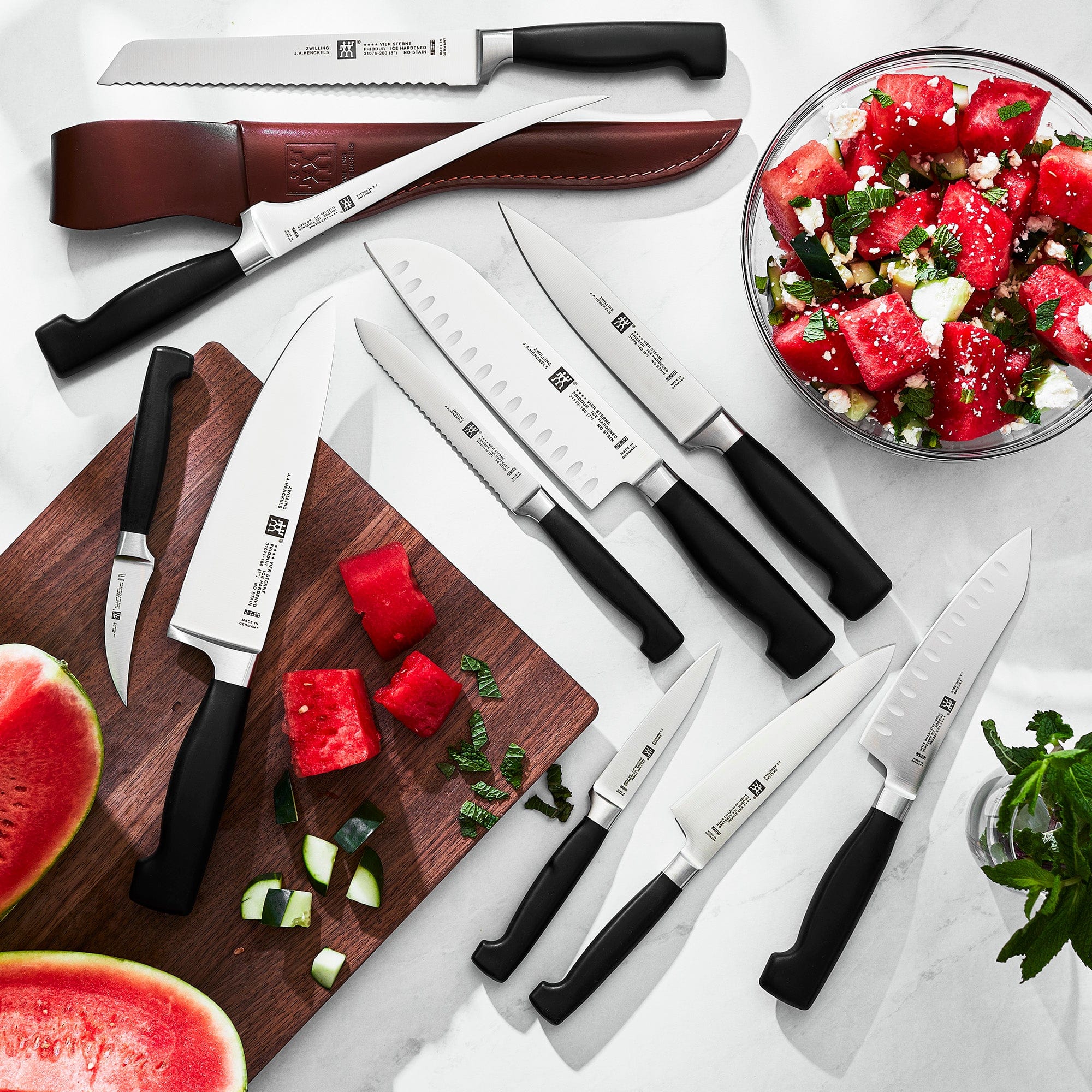 Zwilling Four Star 5-inch Hollow Edge Santoku Knife - Image 3